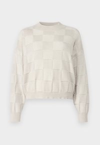 Maglione corto beige chiaro con un design a scacchi testurizzato, scollo rotondo e polsini a coste. Materiale morbido con una leggera lucentezza.