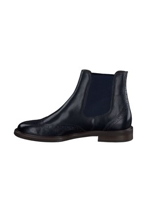 Schwarze Leder-Chelsea-Boots mit elastischen seitlichen Einsätzen, Brogue-Details und einer strukturierten Sohle. Merkmale umfassen eine runde Zehenpartie und einen niedrigen, gestapelten Absatz.