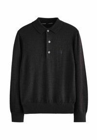 Svart stickad polo-tröja med klassisk krage, treknappslå och en diskret logotyp på bröstet. Mjuk textur och långärmad.