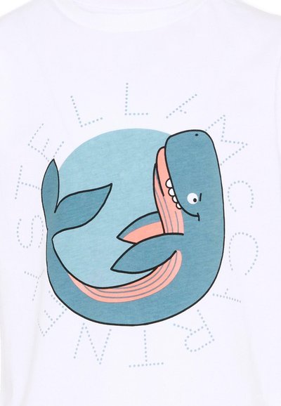 Baleine bleue dessin animé avec bouche ouverte, souriante, entourée de lettres en pointillé formant le texte "WHALE TALKING" sur fond blanc.