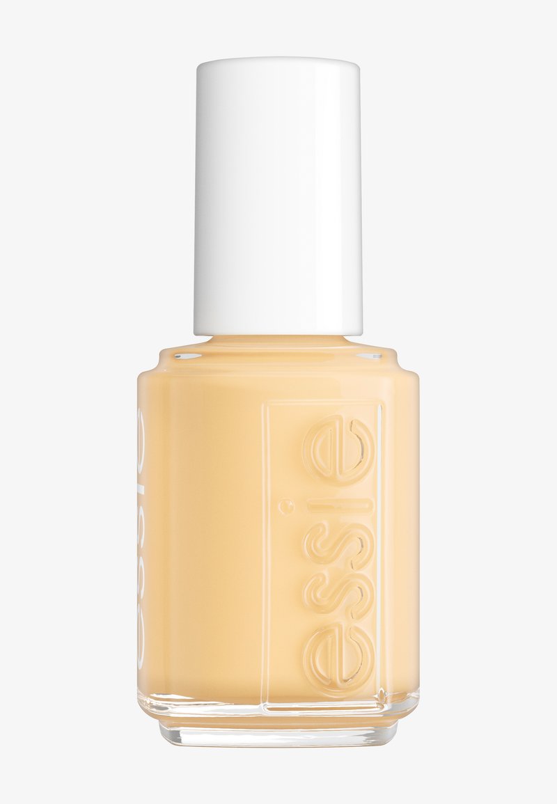 Bouteille de vernis à ongles en verre transparent avec un bouchon blanc, remplie d'un vernis jaune crème. Présente le nom de la marque en relief sur le côté.