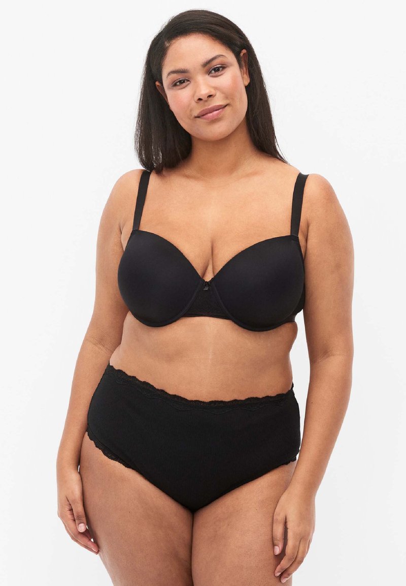Black padded bra with adjustable straps and lace accents. High-waisted black brief with a scalloped lace trim. Smooth texture.