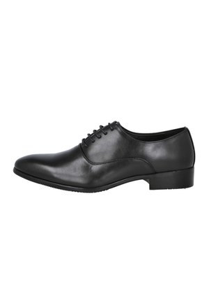 Zapato Oxford de cuero negro para hombre con cordones cerrados, puntera redonda, tacón bajo y acabado liso y pulido, visto de lado.