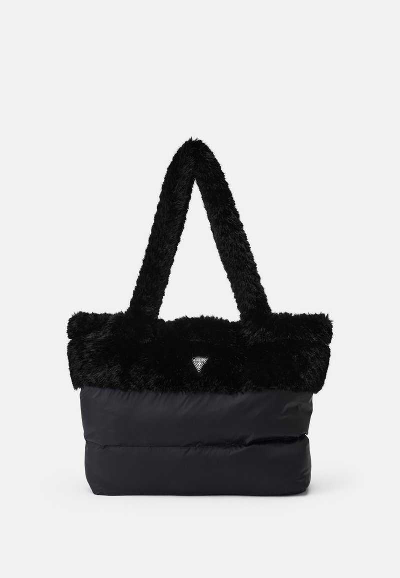 Sac cabas noir avec poignées douces et poilues, corps en tissu lisse, et petit logo triangulaire au centre avant.