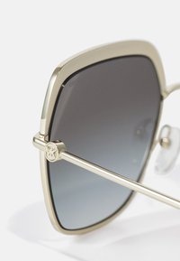 Michael Kors GREENPOINT - Aurinkolasit - light gold-coloured/black