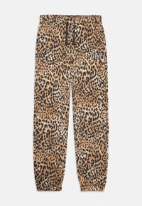 Løveprntede joggebukser i nuancer af brun og sort, med elastisk talje, manchetter og et GAP-logo på siden.