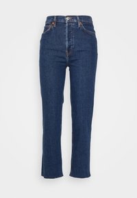 Jeans in denim blu a vita alta con taglio dritto, caratterizzati da orlo grezzo, design classico a cinque tasche e dettagli in hardware tono rame.