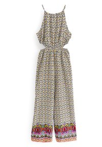 Combinaison à motifs multiples avec des dessins floraux jaunes, bleus et rouges. Comprend des bretelles fines, une taille élastique et des jambes larges.