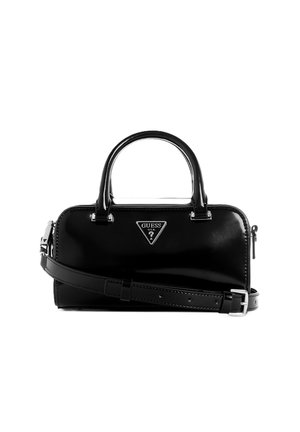 Borsa a mano in pelle verniciata nera con doppi manici, tracolla staccabile, patch logo triangolare e chiusura con zip. Texture liscia e forma strutturata.