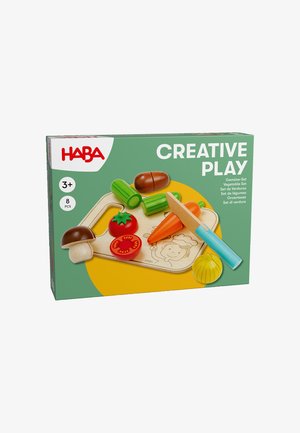 Wooden vegetable playset featuring eight colorful pieces: tomato, carrot, cucumber, and mushroom, with a cutting board and knife.