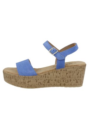 Sandalo con zeppa blu in camoscio, pianta in sughero, cinturino alla caviglia regolabile e ampia fascia anteriore. Texture liscia con finitura in sughero di tonalità beige.