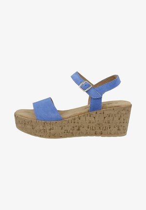 Niebieskie zamszowe sandały na klinie z korkową platformą, regulowanym paskiem wokół kostki i szerokim paskiem z przodu. Gładka faktura z beżowym wykończeniem korka.