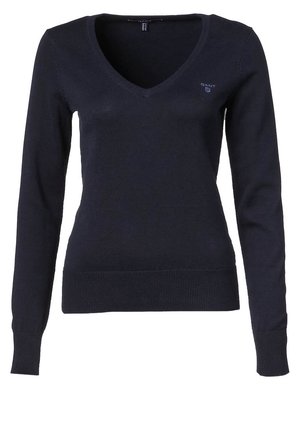 Pull bleu marine à manches longues avec col en V, poignets et ourlet côtelés, avec un petit logo GANT sur le côté gauche de la poitrine.