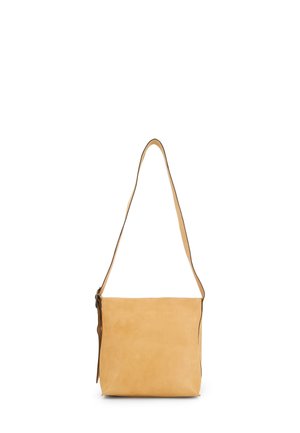 Tan leather shoulder bag with a smooth texture, featuring a long adjustable strap and a zip closure. Minimalist rectangular design.