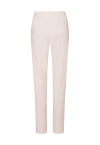 Pantaloni beige chiaro con vita elasticizzata, design slim fit, texture liscia e senza motivi o dettagli in metallo visibili.