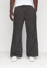 Jack & Jones - JPSTPARACHUTE  WASHED PANT UNISEX - Kalhoty - black Miniatura obrázku 1