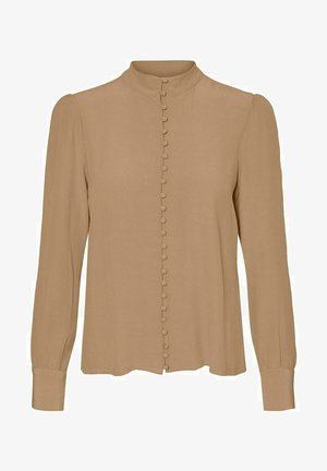 Long-sleeve blouse in light brown fabric, featuring a stand collar, front button closure with small, matching buttons, and a slightly relaxed fit.