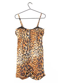 Leopard print romper with adjustable straps, a black zip front, and curved hem. Made of smooth fabric with a mix of orange, black, and beige colors.