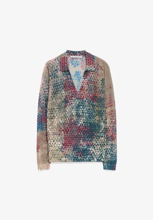 Camicia a maniche lunghe con scollo a V, realizzata in tessuto testurizzato con motivi circolari multicolori nelle tonalità di blu, rosa e beige.