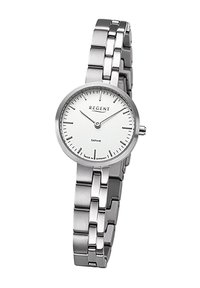 Montre en acier inoxydable argenté avec un cadran blanc rond, marqueurs d'heure argentés minimalistes et un mouvement à quartz. Dotée d'un bracelet à maillons.