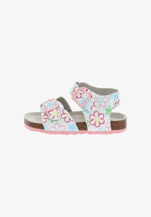 Sandalo bianco per bambini con motivi floreali colorati, due cinturini rosa con fibbia, suola in sughero e suola esterna rosa con battistrada.