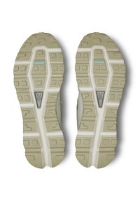 Bežid spordijalatsite tallad, millel on tekstuuriga kummist haardemuster ja valge keskosa. Omab brändingut ja aktsente helesinisena ja hallina.