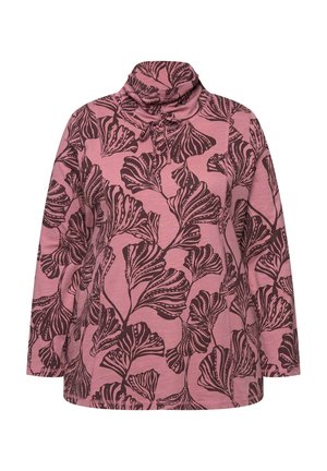 Długi rękaw w różowym materiale z czarnym kwiatowym nadrukiem. Posiada wysoki kołnierz i luźny krój. Miękka tekstura z widocznymi detalami szwów.