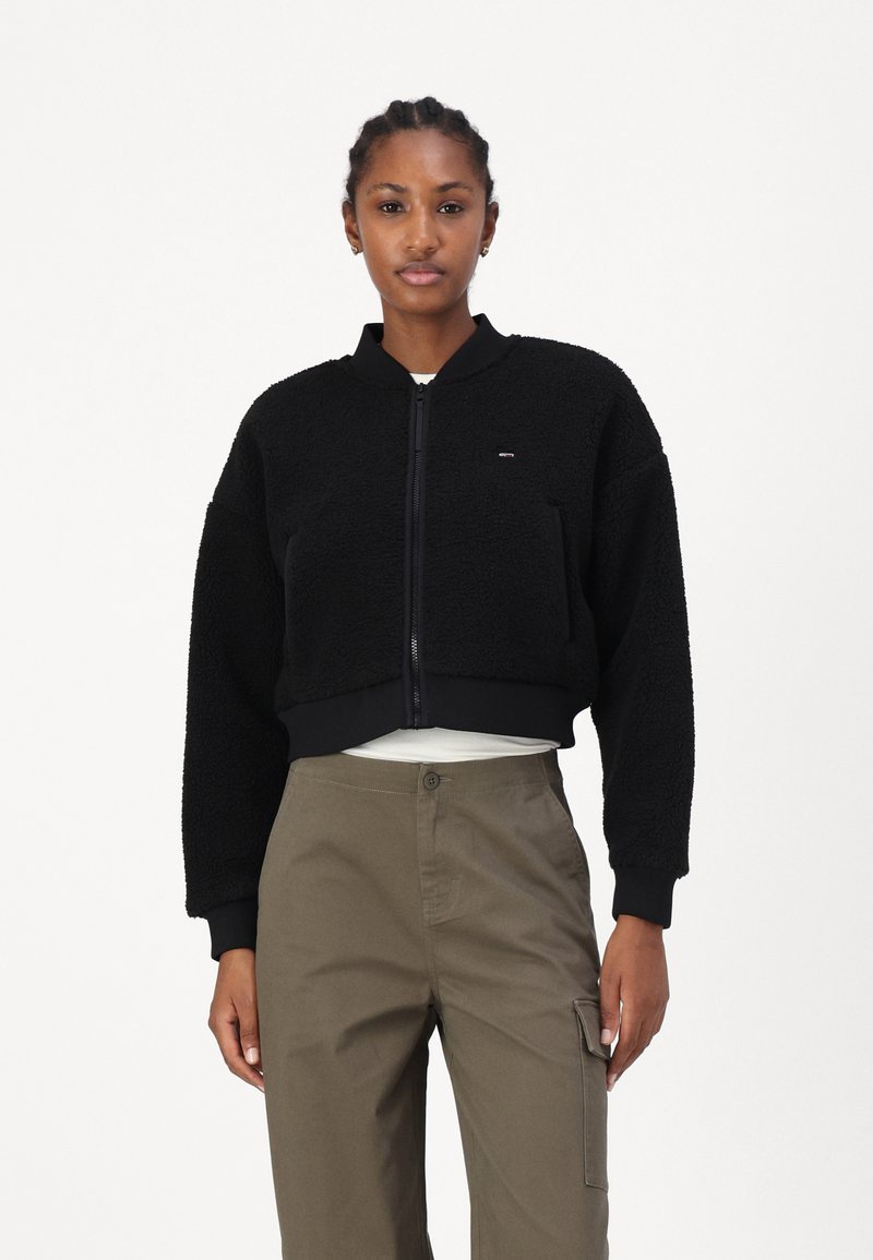 Tommy Jeans Flisinė striukė - black