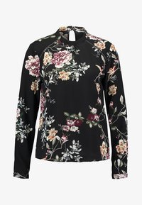 Blusa negra de manga larga con cuello alto, que presenta un patrón floral en tonos rosa, crema, verde y blanco.