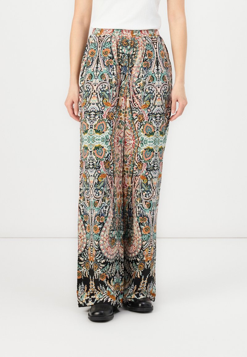 Wide-leg pants in a lightweight fabric featuring a multicolor floral and paisley pattern on a black background. Elastic waist with a drawstring.