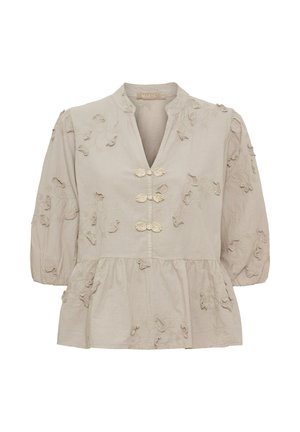 Ljusbeige blus med trekvarts pösärm, blommig brodyr, peplumkant och tre utsmyckade knappbeslag framtill.