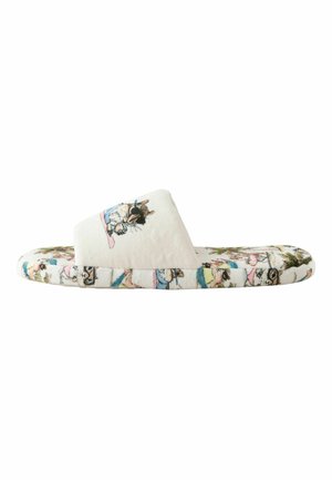 White open-toe slipper with cartoon animal patterns on strap and sole, featuring a cat wearing a blue outfit.