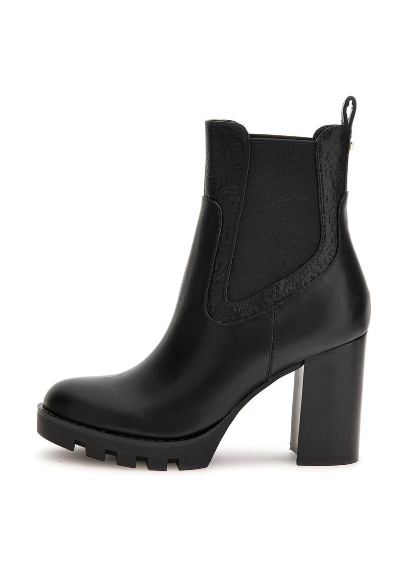 Mustat nahkasaappaat nilkkapituisilla, korkeilla lohkarekorkoineen, joustavin sivupaneelein, kohokuvioidulla designilla ja uritetulla pohjalla parempaa pitoa varten.