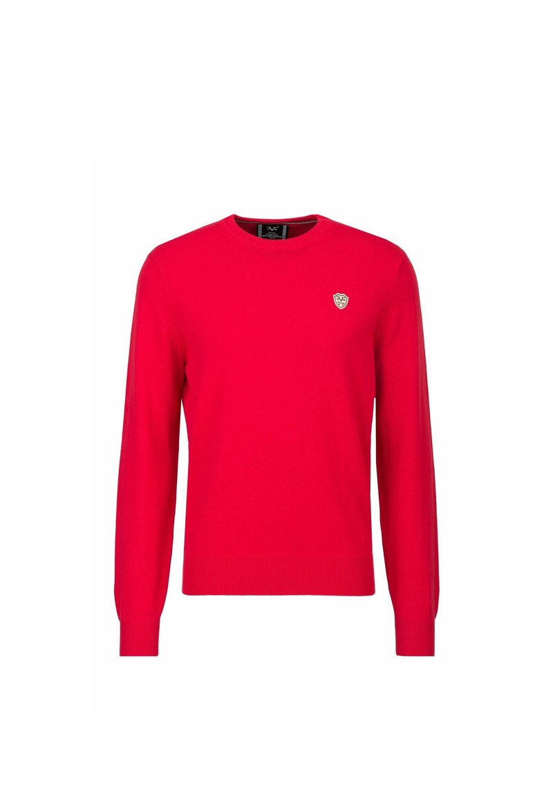 Roter Strickpullover mit langen Ärmeln, rundem Halsausschnitt und einem kleinen goldenen Emblem auf der linken Brust. Glatte Textur und klassisches Design.