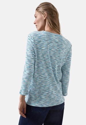 Blue and white horizontal striped long-sleeve shirt with a rounded neckline and textured fabric; loose fit with ribbed detailing.