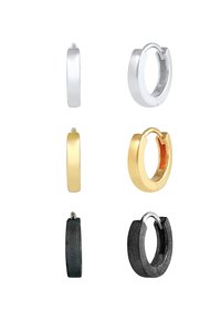 Juego de seis pendientes de aro en plata, oro y negro. Presenta formas cilíndricas con acabados brillantes y mates; varios anchos y diseños.