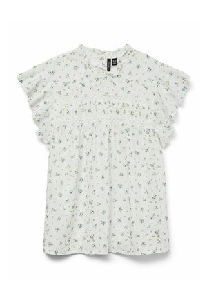 Valge lühikeste varrukatega pluus, millel on sinise ja rohelise lillemuster, frill-varrukad ja pitsdetail rindkeres. Ümmargune kaelus.