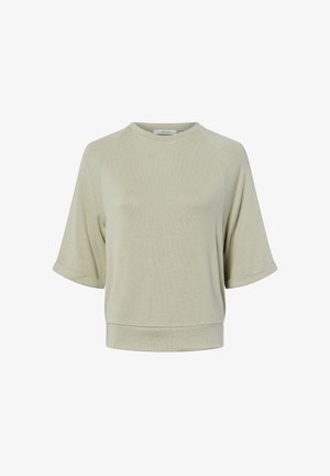 Jasnozielona koszulka krótki rękaw, wykonana z miękkiego materiału, o luźnym kroju. Ma klasyczny dekolt i mankiety, minimalistyczny design.
