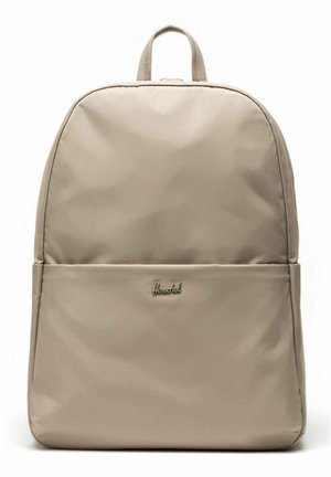 Sac à dos Herschel beige avec une poche avant et une poignée supérieure, présenté de face sur fond blanc.