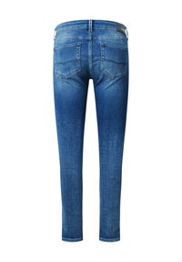 Jean slim en denim bleu avec une taille mi-haute, cinq poches, et une texture légèrement décolorée. L'arrière présente deux poches cousues.