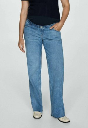 Light blue, loose-fitting jeans made of denim. Features a button fly, five pockets, and frayed hem at the bottom. Silver hardware accents.