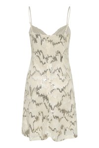 Beež siidkleit õhukeste rihmadega, millel on laineline hõbedane paljettmuster tekstureeritud kangal. A-line siluett, põlvekõrgune.