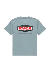 Light blue short-sleeve T-shirt featuring a bold black and red RVCA logo with text on the back, made of soft cotton fabric.