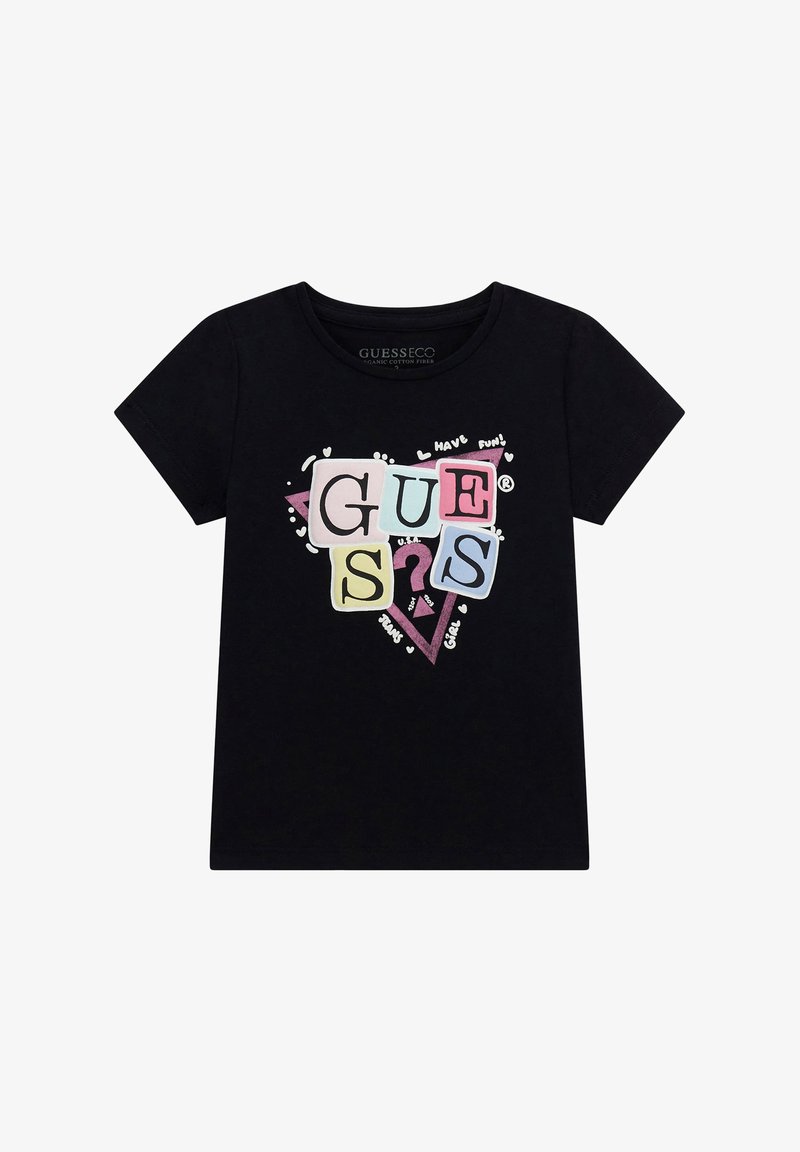 Černé bavlněné tričko s barevným grafickým nápisem "GUESS" s písmennými pastelovými odstíny a hravými akcenty. Krátké rukávy a design s kulatým výstřihem.