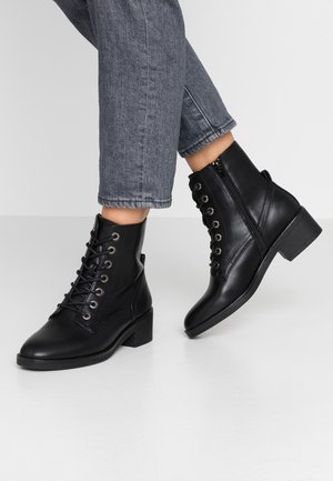 Bottines à lacets - black