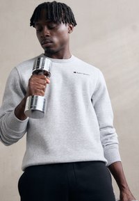 Champion ICONS HEM PANTS - Treniņtērpa apakšdaļas - black