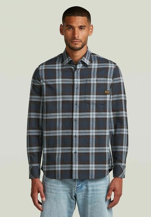 Mannen langemouwen geruite shirt in donkerblauw en lichtblauw, met een zak en knopen. Gemaakt van een gestructureerde stof met een klassieke kraag.