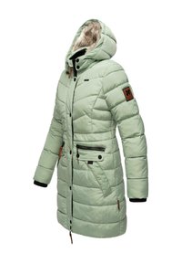 Light green padded coat with a fur-lined hood, zippered pockets, and snap buttons. Features ribbed cuffs and a fabric patch on the shoulder.