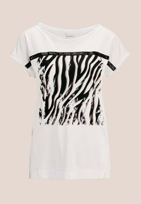 Weißes Kurzarm-T-Shirt mit einem schwarz-weißen Zebra-Streifen-Design, einem strukturierten Oberband und seitlichen Schlitzen am Saum.