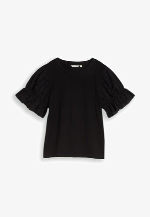 Top noir à manches courtes avec encolure ronde et manches bouffantes en dentelle à œillets avec détails volantés.